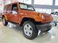 Front 3/4 View of 2011 Wrangler Unlimited Sahara 4x4