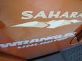 2011 Jeep Wrangler Unlimited Sahara 4x4 Badge and Logo Photo