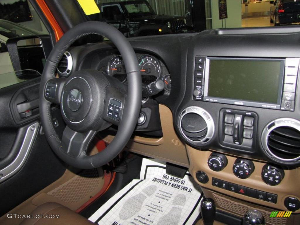 2011 Jeep Wrangler Unlimited Sahara 4x4 Black/Dark Saddle Dashboard Photo #41885843