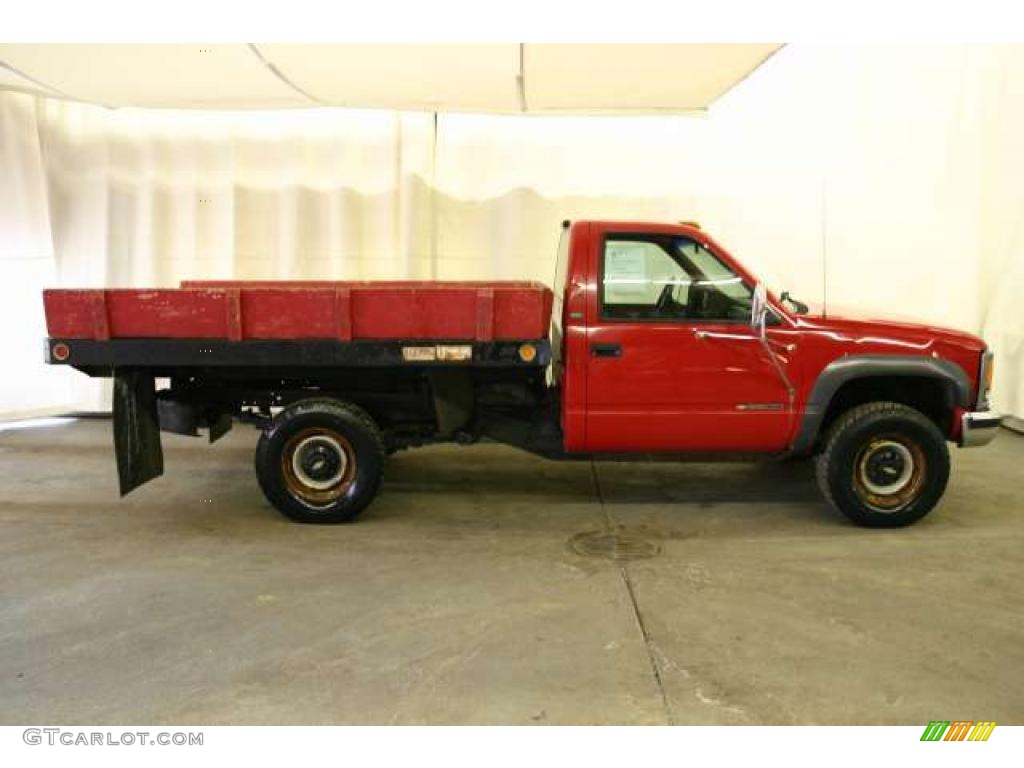 Victory Red 1994 Chevrolet C/K 3500 Regular Cab 4x4 Stake Truck Exterior Photo #41908556