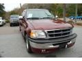 1997 Dark Toreador Red Metallic Ford F150 XLT Extended Cab  photo #1