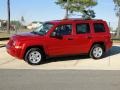 2009 Inferno Red Crystal Pearl Jeep Patriot Sport  photo #10