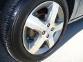 2006 Saturn ION 3 Quad Coupe Wheel and Tire Photo