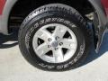 2003 Ford F150 XLT SuperCab 4x4 Wheel and Tire Photo