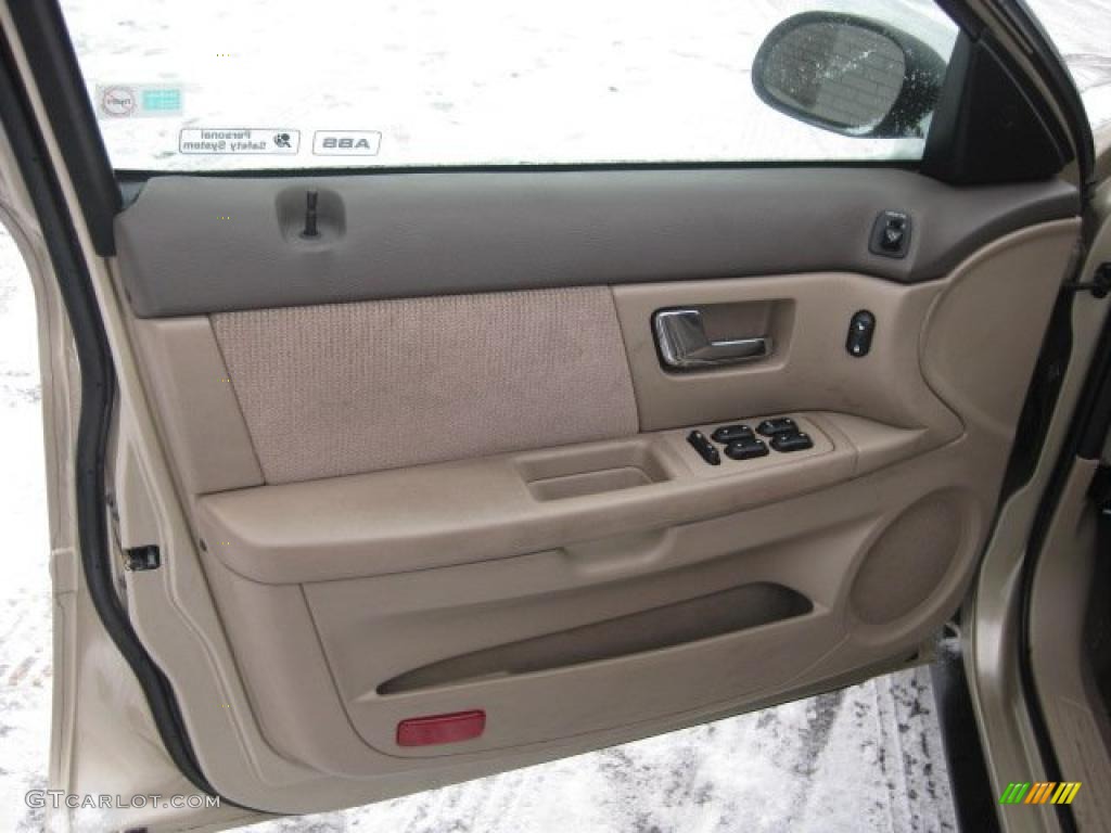 2000 Ford Taurus SES Medium Parchment Door Panel Photo #42081587