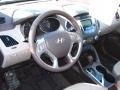Taupe 2011 Hyundai Tucson Limited Steering Wheel