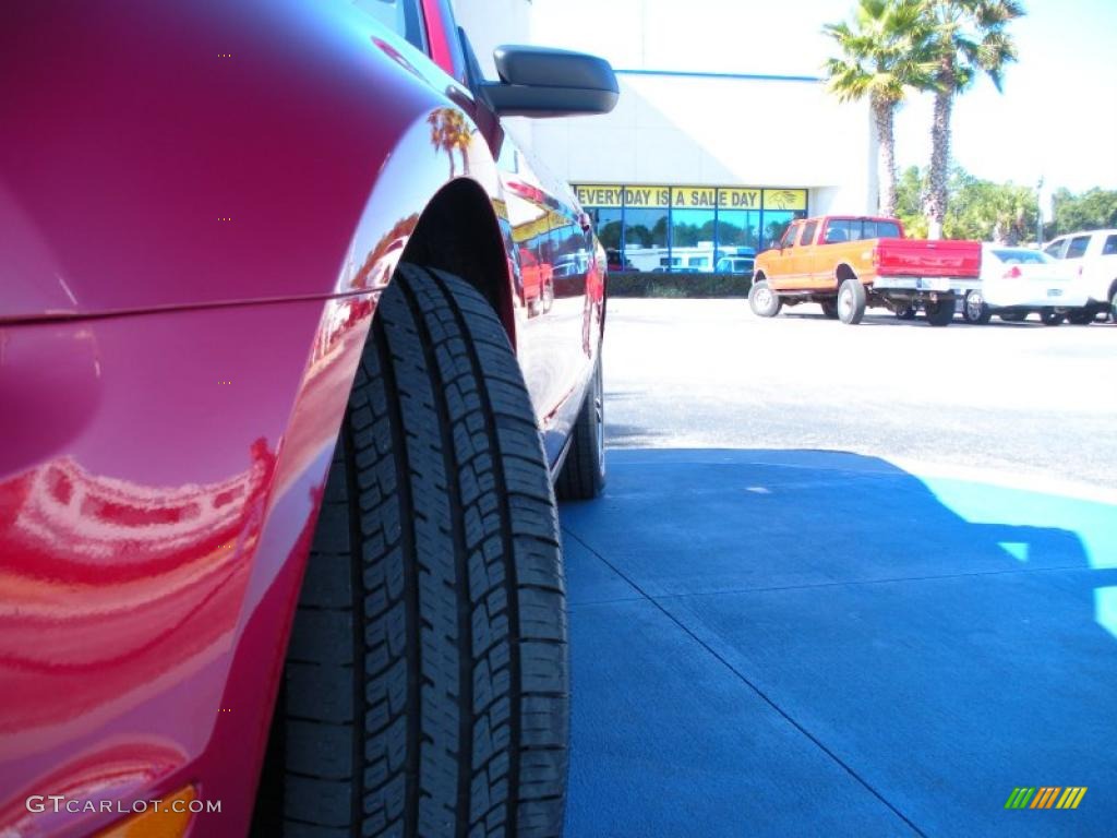 2010 Mustang V6 Premium Convertible - Red Candy Metallic / Stone photo #15