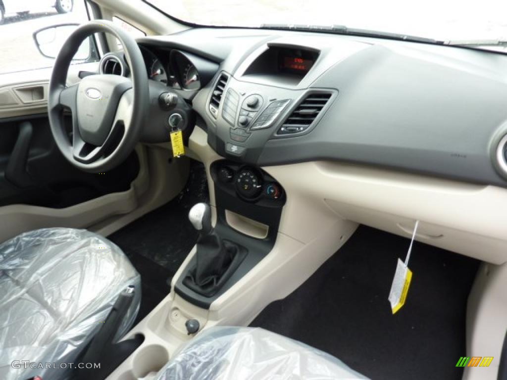 2011 Ford Fiesta S Sedan Light Stone/Charcoal Black Cloth Dashboard Photo #42114701