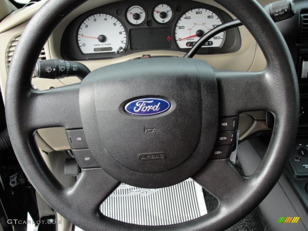 2004 Ford Ranger Edge SuperCab Black/Medium Pebble Steering Wheel Photo #42130803