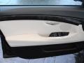 2010 BMW 5 Series Ivory White/Black Nappa Leather Interior Door Panel Photo
