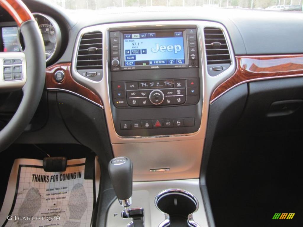 2011 Jeep Grand Cherokee Overland New Saddle/Black Dashboard Photo #42134903