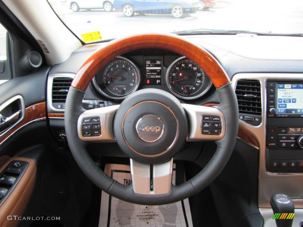2011 Jeep Grand Cherokee Overland New Saddle/Black Steering Wheel Photo #42134919