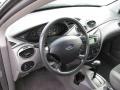 2003 Liquid Grey Metallic Ford Focus SE Sedan  photo #8