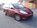 2010 Salsa Red Pearl Toyota Sienna LE  photo #2