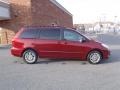 2010 Salsa Red Pearl Toyota Sienna LE  photo #14