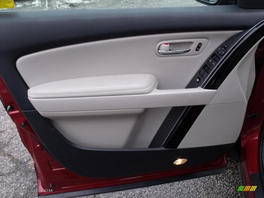 2010 Mazda CX-9 Touring AWD Sand Door Panel Photo #42163268