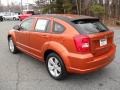 2011 Mango Tango Pearl Dodge Caliber Mainstreet  photo #2