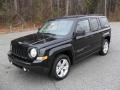 Front 3/4 View of 2011 Patriot Latitude