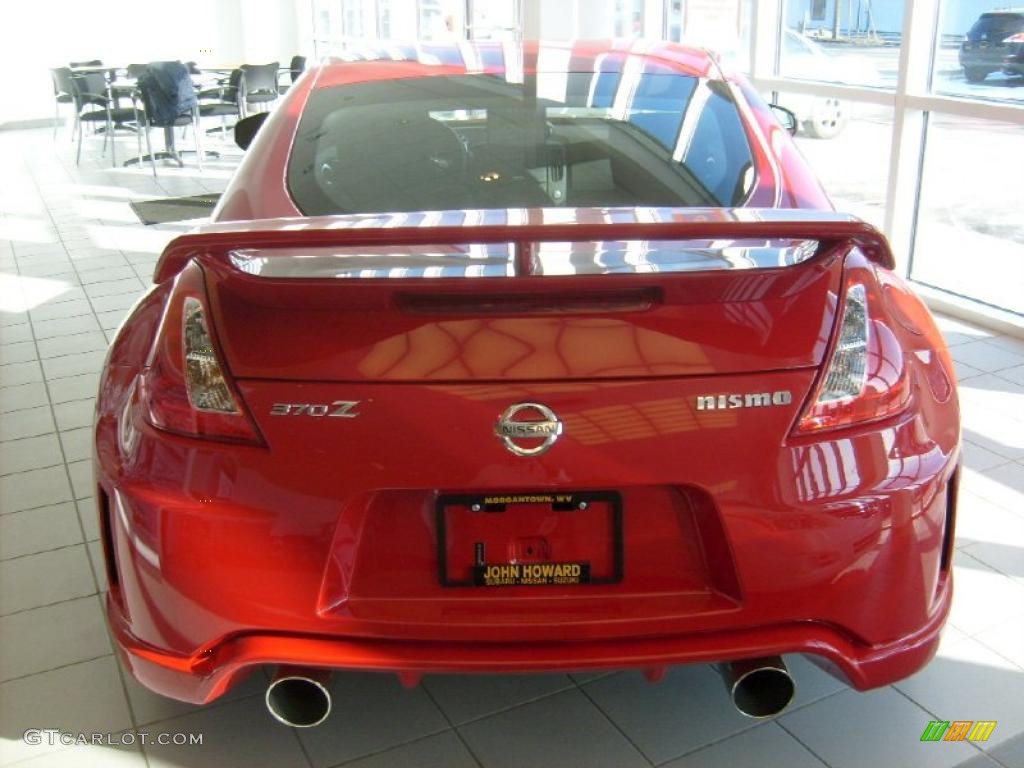 Solid Red 2010 Nissan 370Z NISMO Coupe Exterior Photo #42199263
