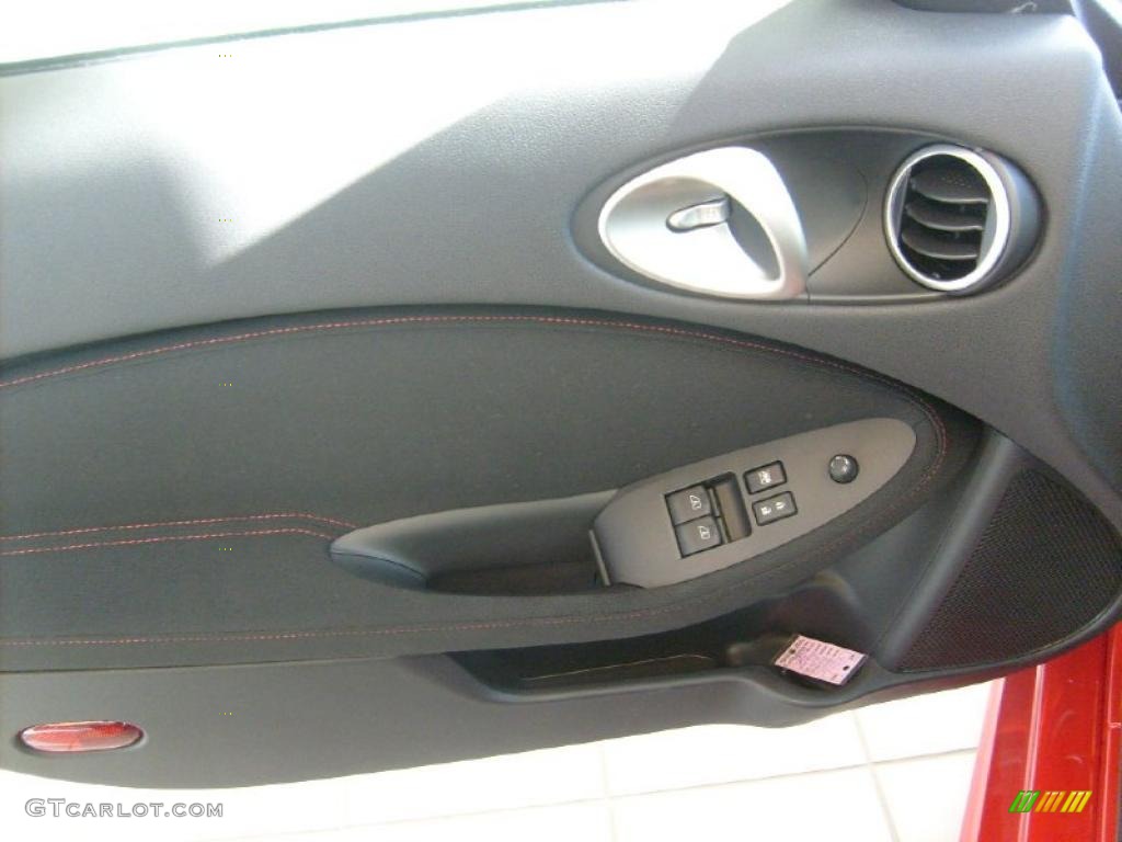 2010 Nissan 370Z NISMO Coupe NISMO Black/Red Cloth Door Panel Photo #42199379