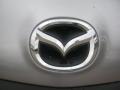 2011 Mazda MAZDA3 i Touring 4 Door Badge and Logo Photo