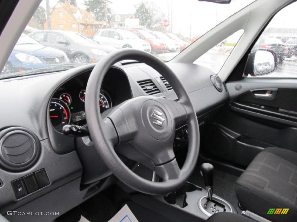 Black Interior 2010 Suzuki SX4 Sport Sedan S Photo #42217216