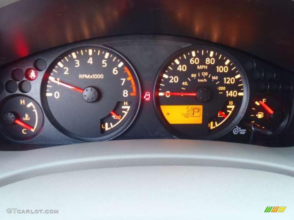 2011 Nissan Frontier SV Crew Cab Gauges Photo #42244675