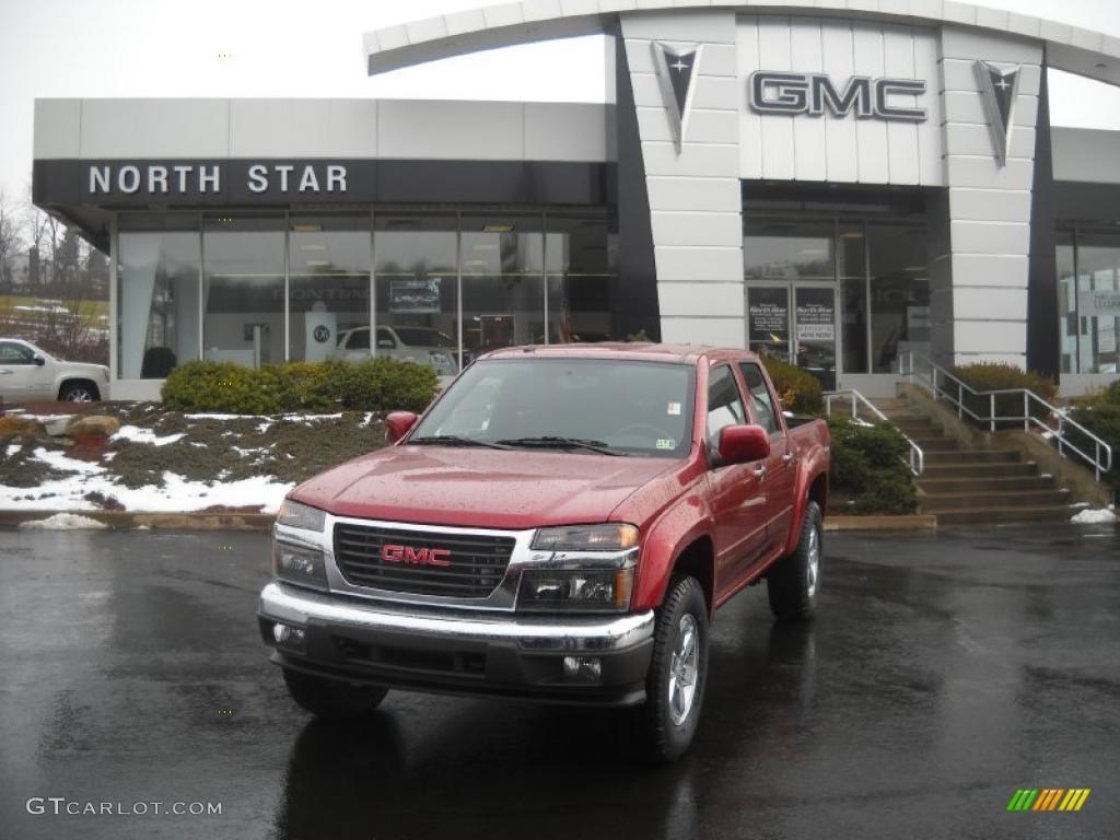 2011 Canyon SLE Crew Cab 4x4 - Merlot Jewel Red Metallic / Ebony photo #1