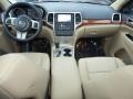 Black/Light Frost Beige Interior Photo for 2011 Jeep Grand Cherokee #42347516