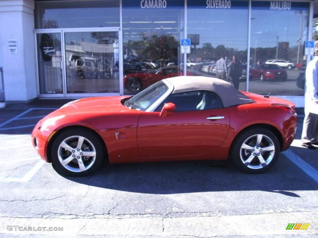 2009 Solstice GXP Roadster - Wicked Ruby Red / Ebony photo #1