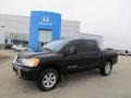 2009 Galaxy Black Nissan Titan SE Crew Cab 4x4  photo #1