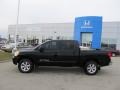 2009 Galaxy Black Nissan Titan SE Crew Cab 4x4  photo #2