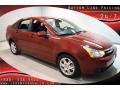 2009 Sangria Red Metallic Ford Focus SES Sedan  photo #1