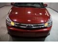 2009 Sangria Red Metallic Ford Focus SES Sedan  photo #2