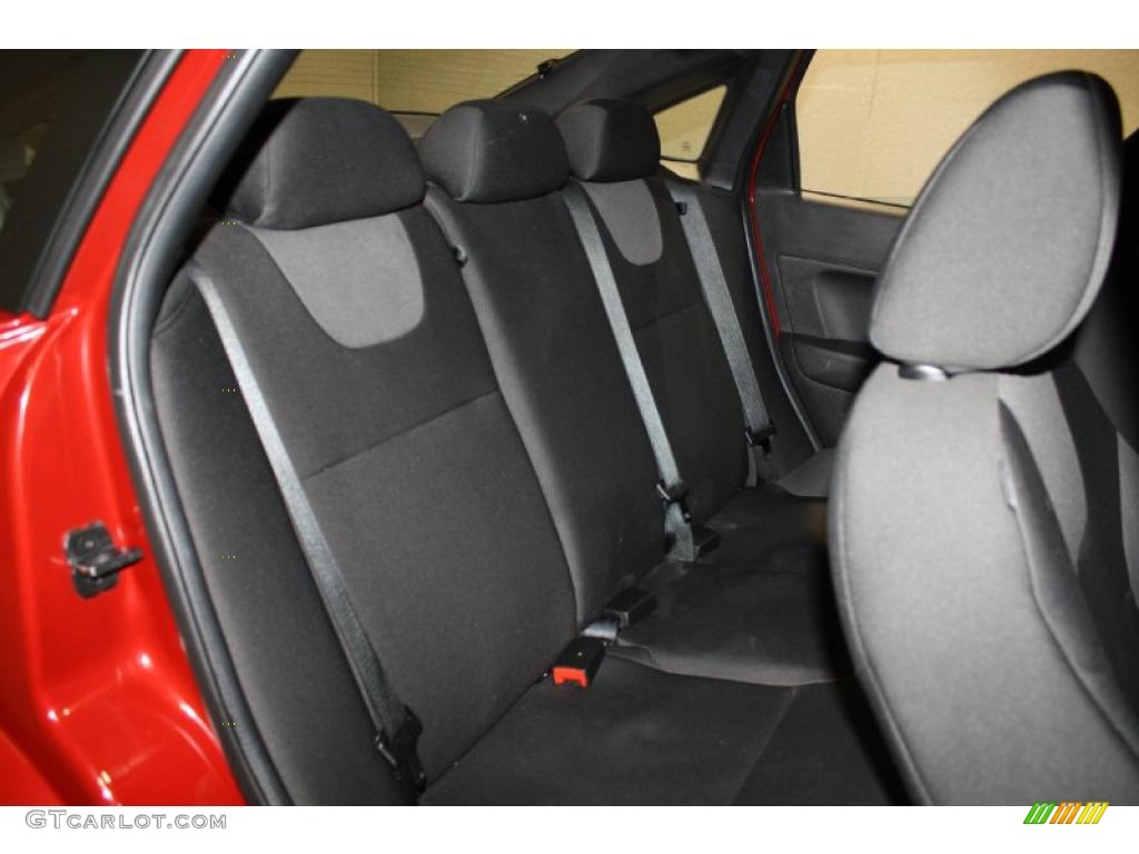 2009 Focus SES Sedan - Sangria Red Metallic / Medium Stone photo #33
