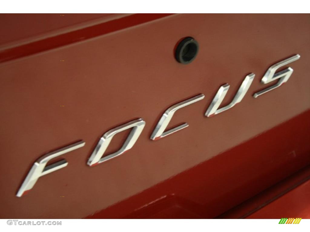 2009 Focus SES Sedan - Sangria Red Metallic / Medium Stone photo #38