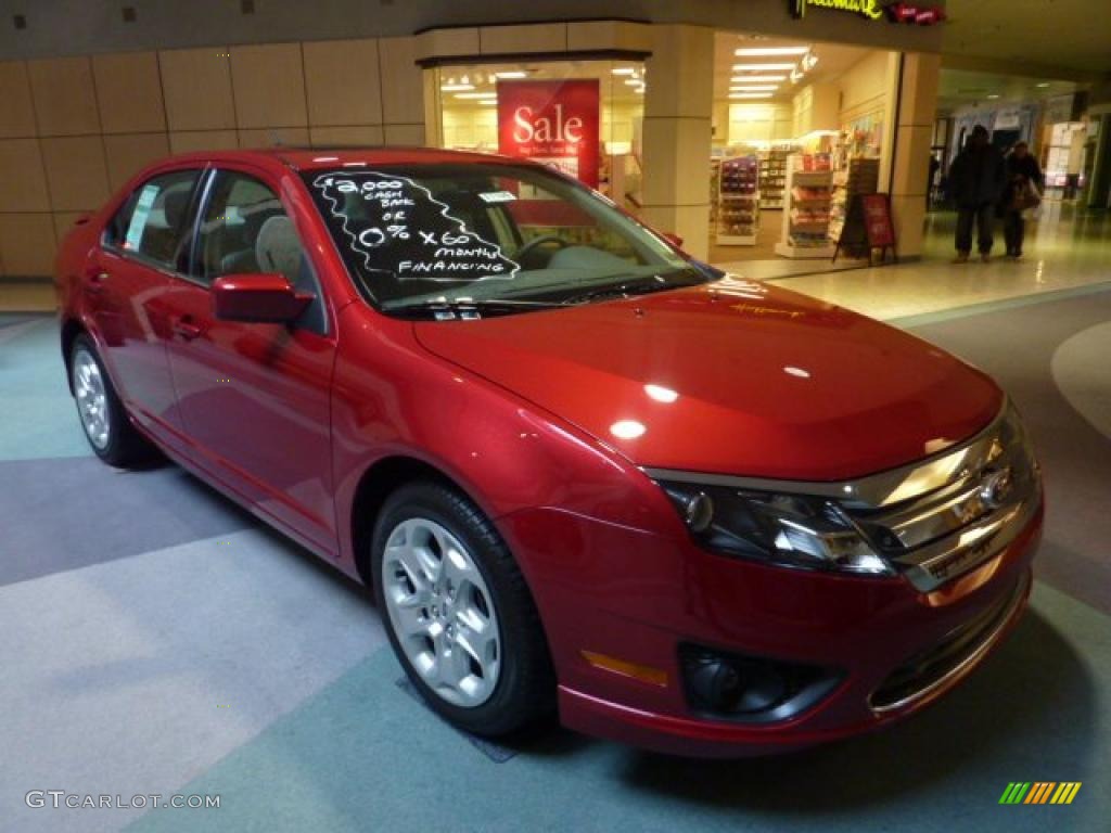 2011 Fusion SE - Red Candy Metallic / Medium Light Stone photo #1