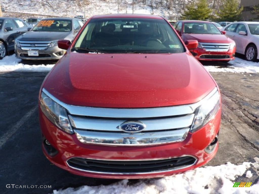 2011 Fusion SE - Red Candy Metallic / Charcoal Black photo #6