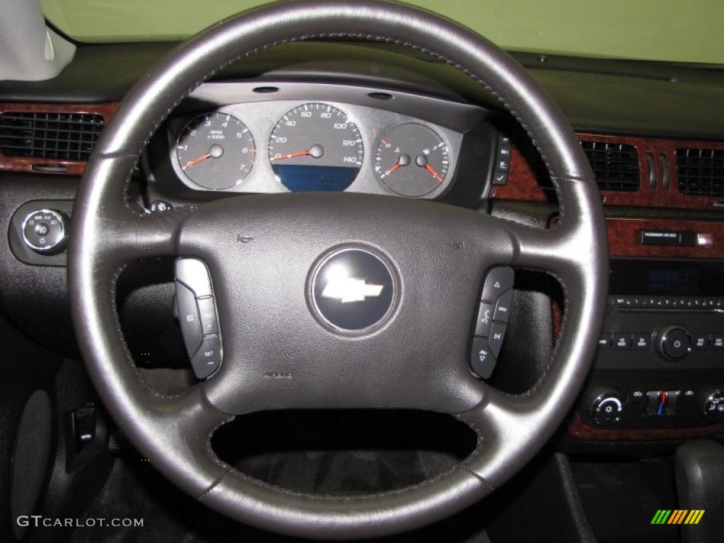 2011 Chevrolet Impala LT Ebony Steering Wheel Photo #42590650