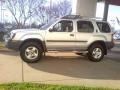 2003 Silver Ice Metallic Nissan Xterra XE V6 4x4  photo #17