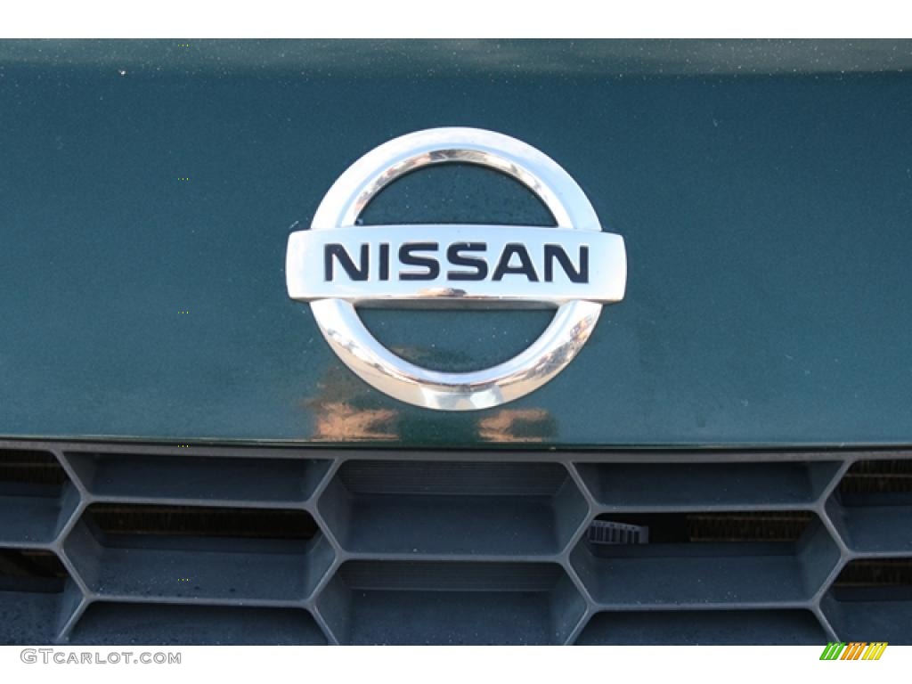 2002 Nissan Xterra XE V6 SC 4x4 Marks and Logos Photos