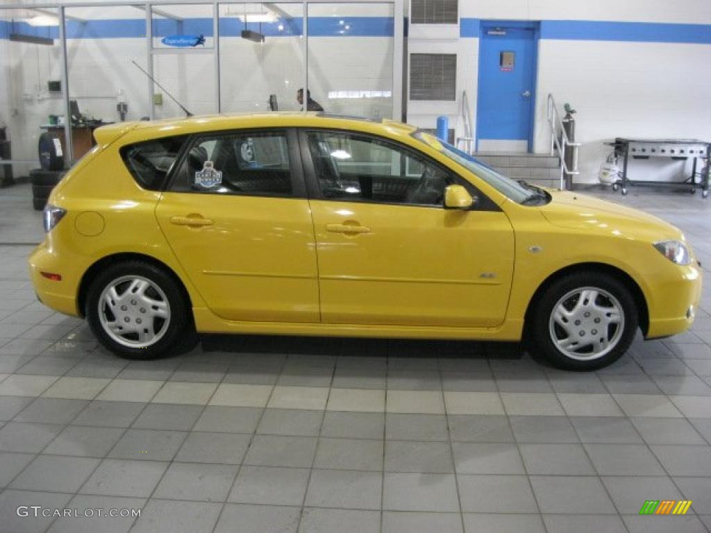 Solar Yellow Mica 2004 Mazda MAZDA3 s Hatchback Exterior Photo #42612440