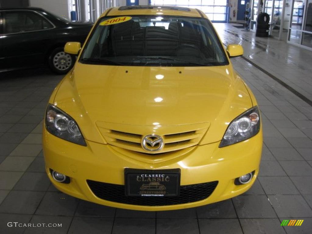 2004 MAZDA3 s Hatchback - Solar Yellow Mica / Black/Blue photo #5