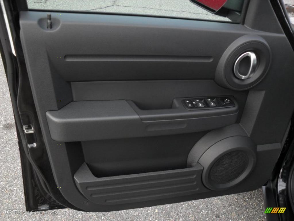 2011 Dodge Nitro Heat Dark Slate Gray Door Panel Photo #42618276