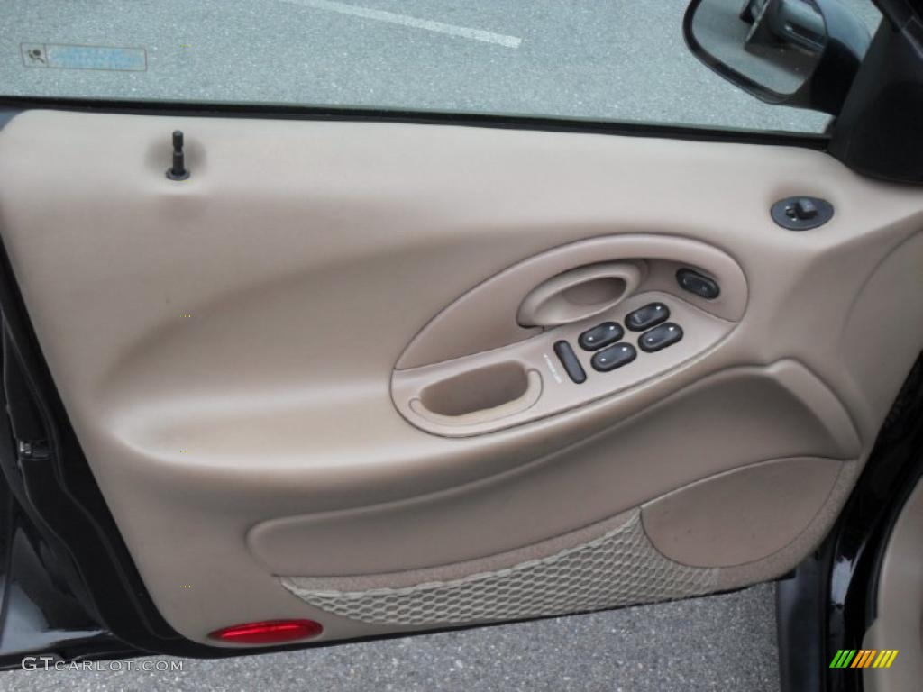 1998 Taurus SE - Black / Medium Prairie Tan photo #8
