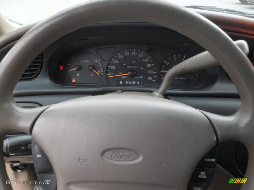 1998 Taurus SE - Black / Medium Prairie Tan photo #10
