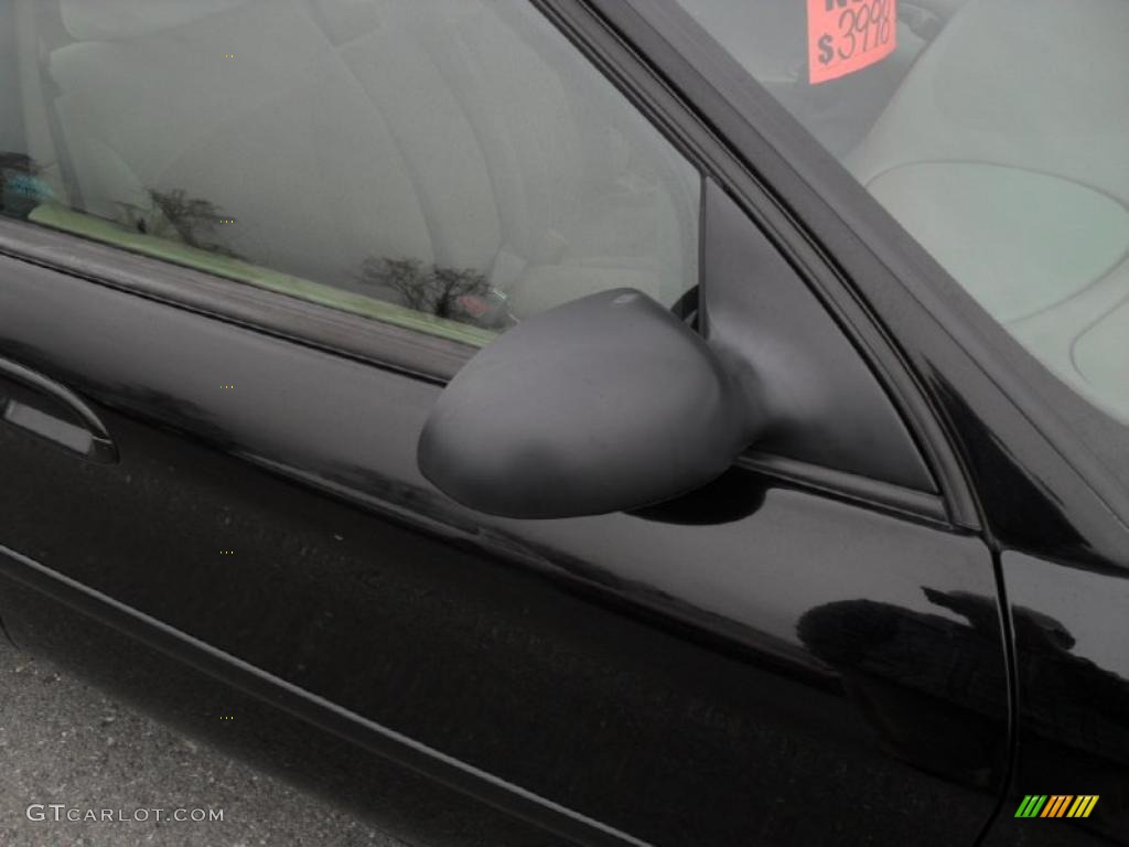 1998 Taurus SE - Black / Medium Prairie Tan photo #21