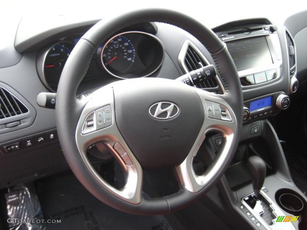 2011 Hyundai Tucson Limited AWD Black/Saddle Steering Wheel Photo #42648308