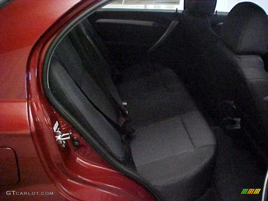 2011 Aveo LT Sedan - Sport Red / Charcoal photo #9