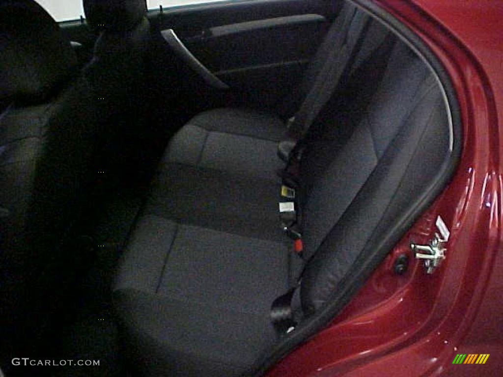 2011 Aveo LT Sedan - Sport Red / Charcoal photo #11